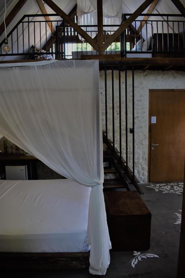 جيمباران Chanteak Bali - Stone House 3 المظهر الخارجي الصورة